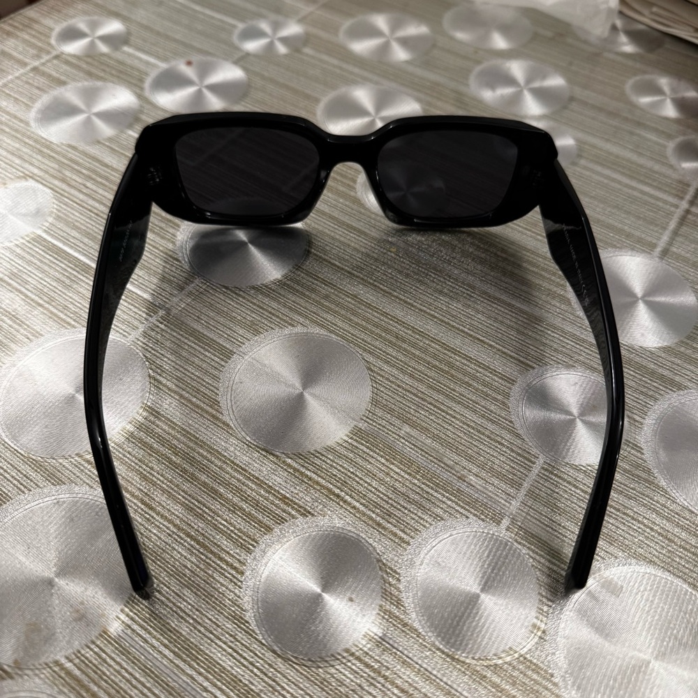 Prada Elegant Black Sunglasses - Picture 3 of 7